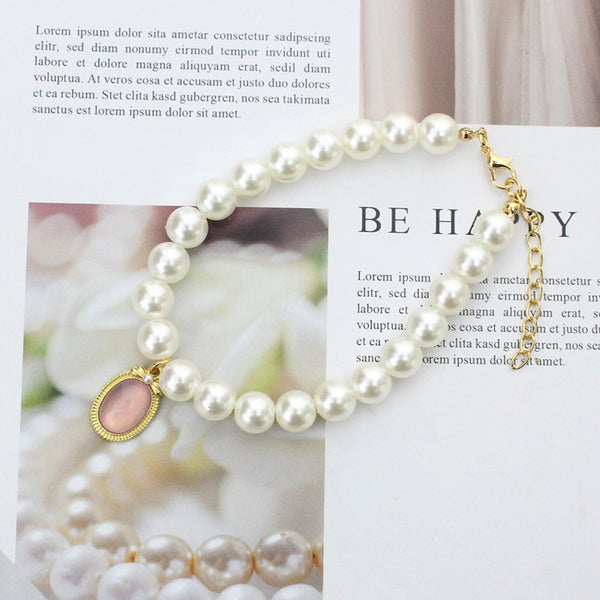 Pearl & Rose Quartz Pet Collar – Cream pearl strand with pink cabochon pendant, gold setting, feng shui pet necklace