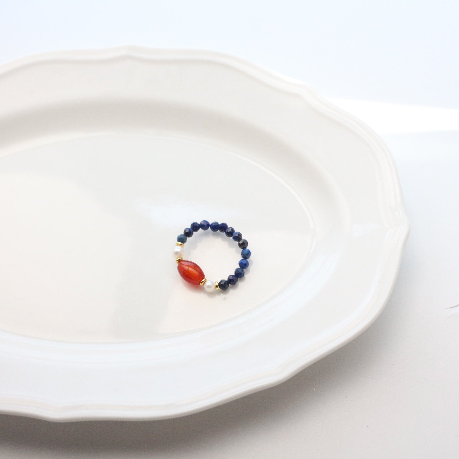 Lapis Lazuli Agate Ring Set – blue lapis band with red agate barrel and freshwater pearl accents, gold beads, white plate