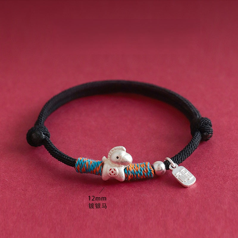 Year of the Horse Bracelet – Black cord silver horse charm with wraps on red, protection jewelry