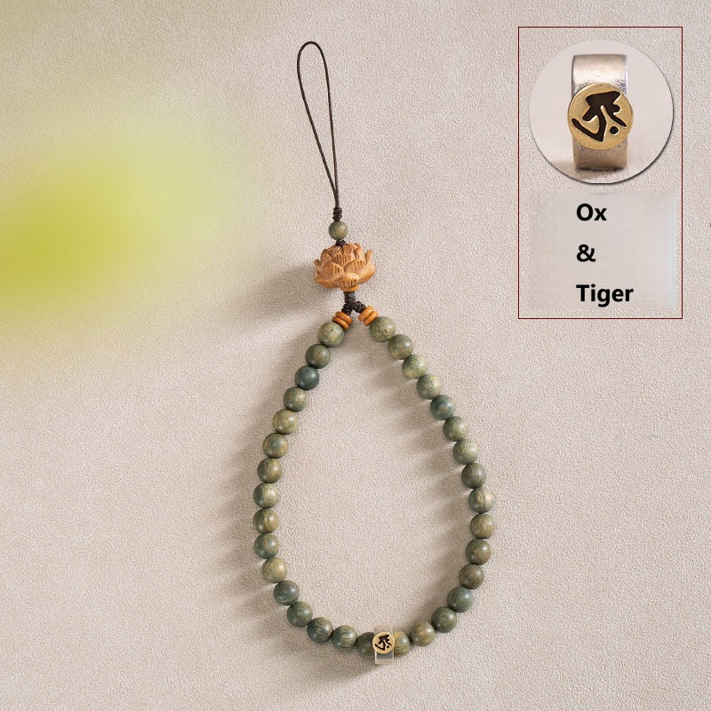 Zodiac Wood Bead Lanyard – Green sandalwood strand with silver Ox and Tiger zodiac token detail, birth year phone charm