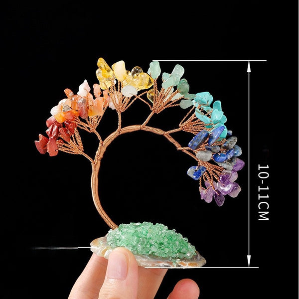 Chakra Crystal Tree – hand holding rainbow chakra tree with 10-11cm size label, black background, scale reference