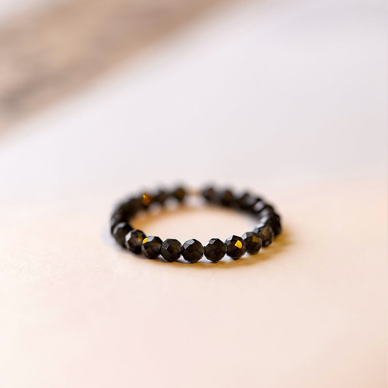 2mm Citrine Ring – Tiny black faceted bead ring on white, sleek obsidian stacking ring for women