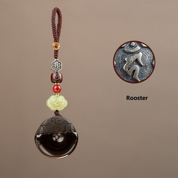 Pixiu Keychain – Rooster zodiac silver glyph on ice obsidian disc with braided cord