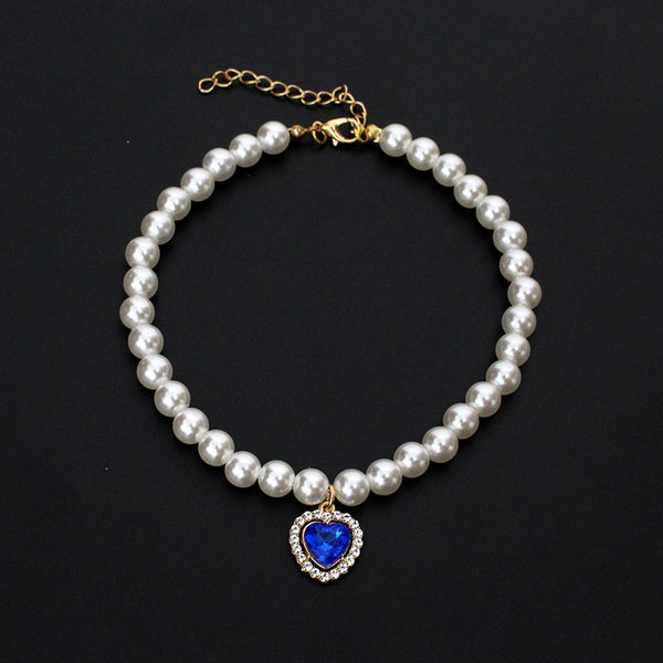 Crystal Heart Pet Necklace – Pearl collar with dark blue heart crystal pendant and rhinestone halo, black