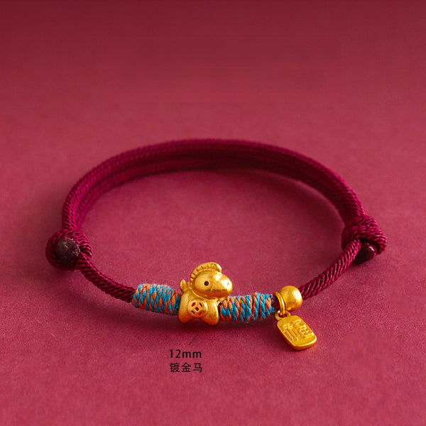 Year of the Horse Bracelet – Red cord gold horse charm with blue-orange wraps on red, prosperity