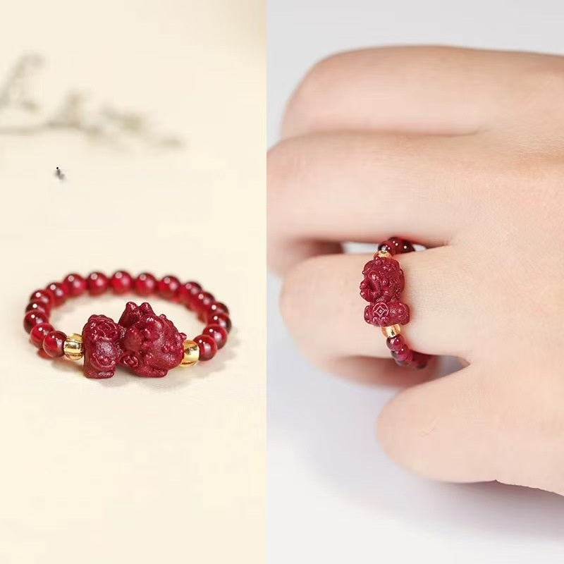 Cinnabar Pi Xiu Ring – Red cinnabar Pi Xiu carved bead ring with gold spacers, product and worn split view