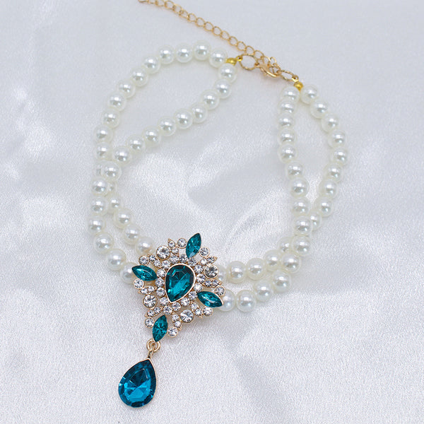 Elegant Pearl Crystal Collar – Double-layer pearl collar with teal teardrop crystal and rhinestones, satin