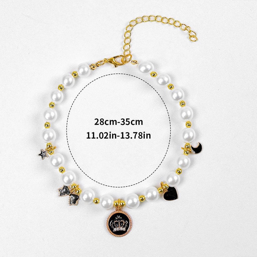 Luxury Crystal Pet Necklace – pearl collar with black crown medallion, star moon heart bow charms, gold spacers