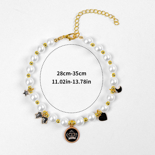 Luxury Crystal Pet Necklace – pearl collar with black crown medallion, star moon heart bow charms, gold spacers