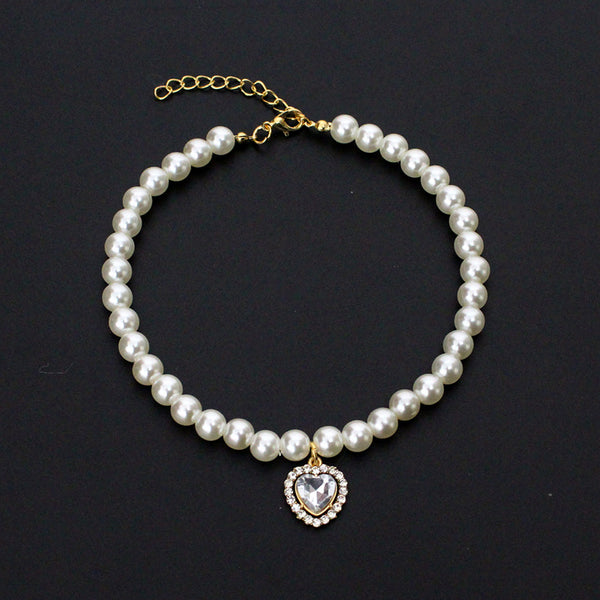 Crystal Heart Pet Necklace – Pearl collar with clear heart crystal pendant surrounded by rhinestones, black