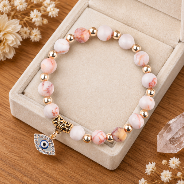 Pink Zebra Stone Evil Eye Bracelet - flat lay