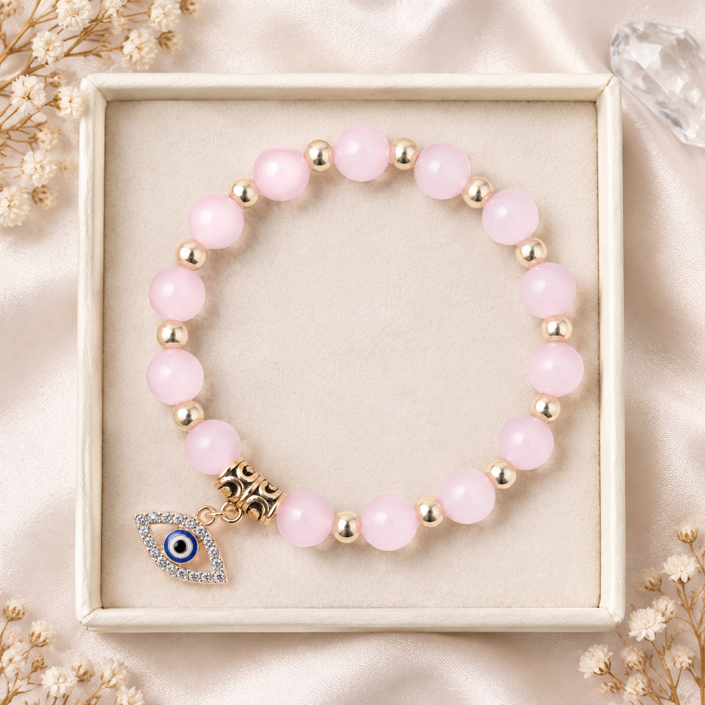 Pale Pink Rose Quartz Evil Eye Bracelet - flat lay