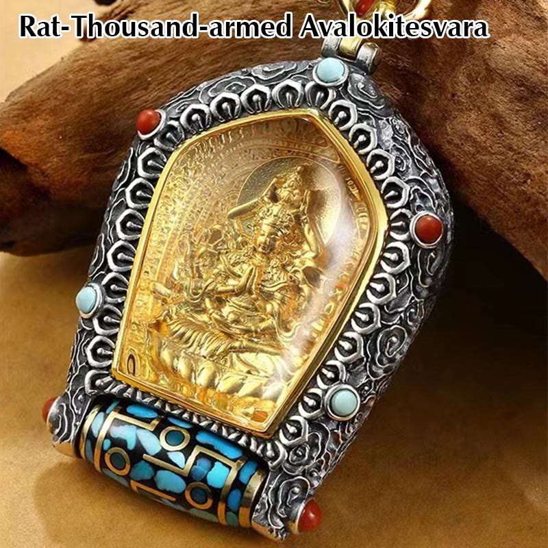Tibetan Zodiac Buddha Dzi Bead Necklace – Gold Samantabhadra Bodhisattva figure in silver scrollwork frame with turquoise coral and decorated prayer wheel on wood branch close-up