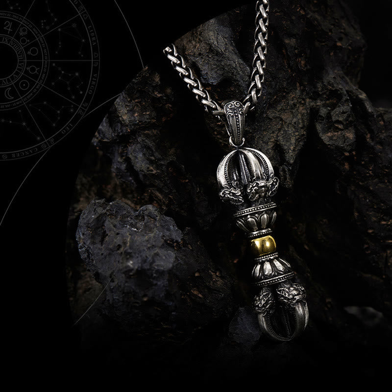 Tibetan Vajra Dorje Pendant Necklace – Antiqued silver with gold lotus center, beast head motifs and chain on dark textured stone