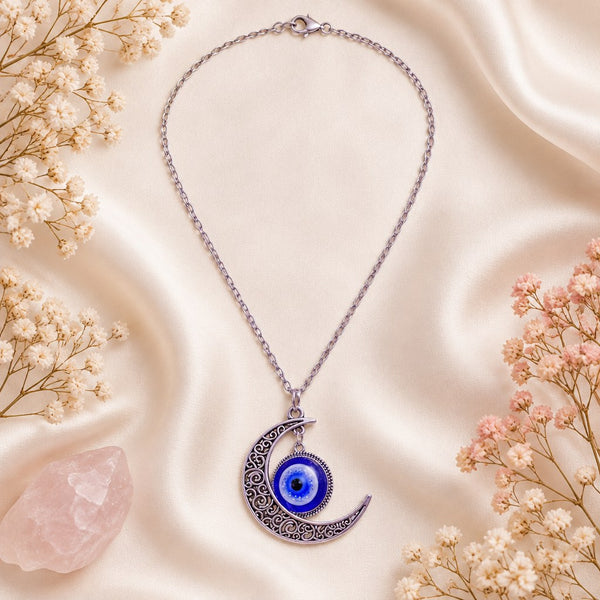 Turkish Blue Evil Eye Necklace - Flat lay of the geometric blue eye pendant, nazar charm