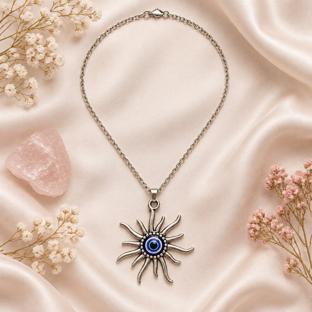 Turkish Blue Evil Eye Sunburst Necklace - Flat lay of the sunburst blue eye pendant, nazar charm