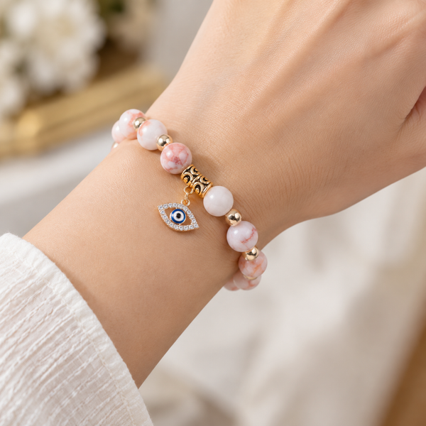 White Pink Veined Stone Evil Eye Bracelet - wear closeup