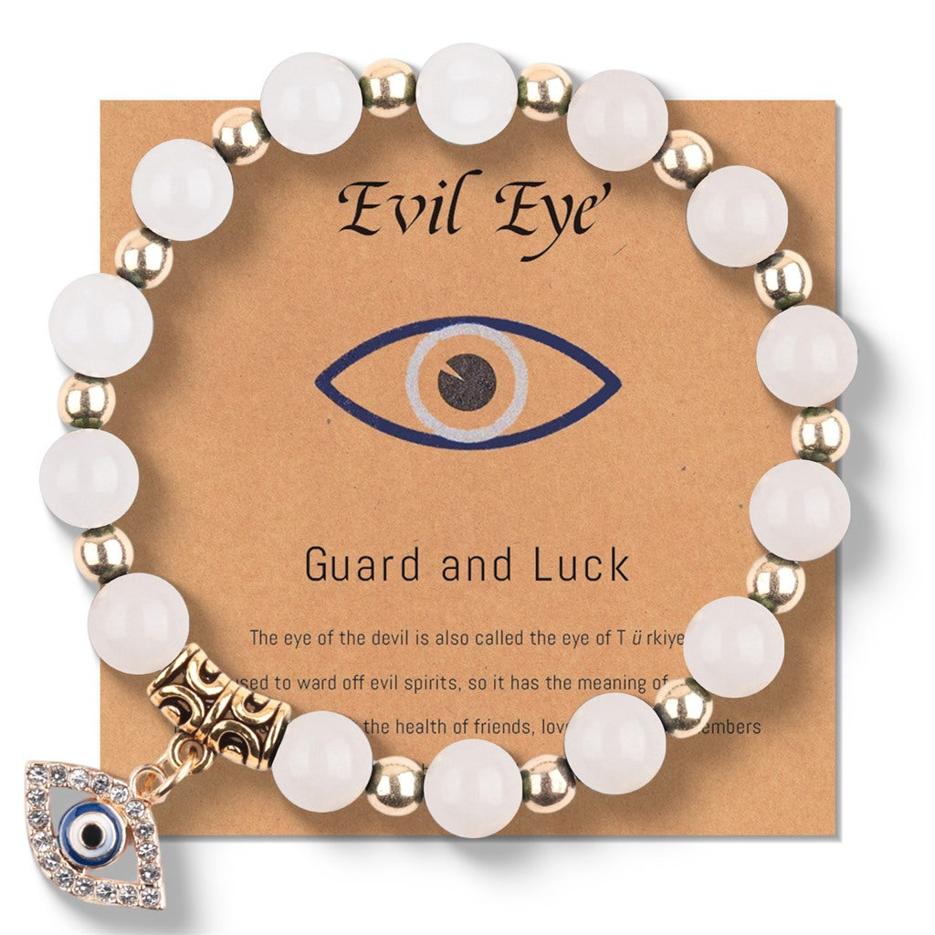White Smooth Stone Evil Eye Bracelet - product reference photo