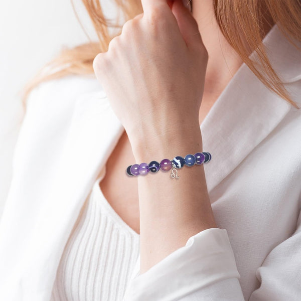 Zodiac Purple Agate Bracelet worn on women wrist, gradient purple beads with charm, model wear